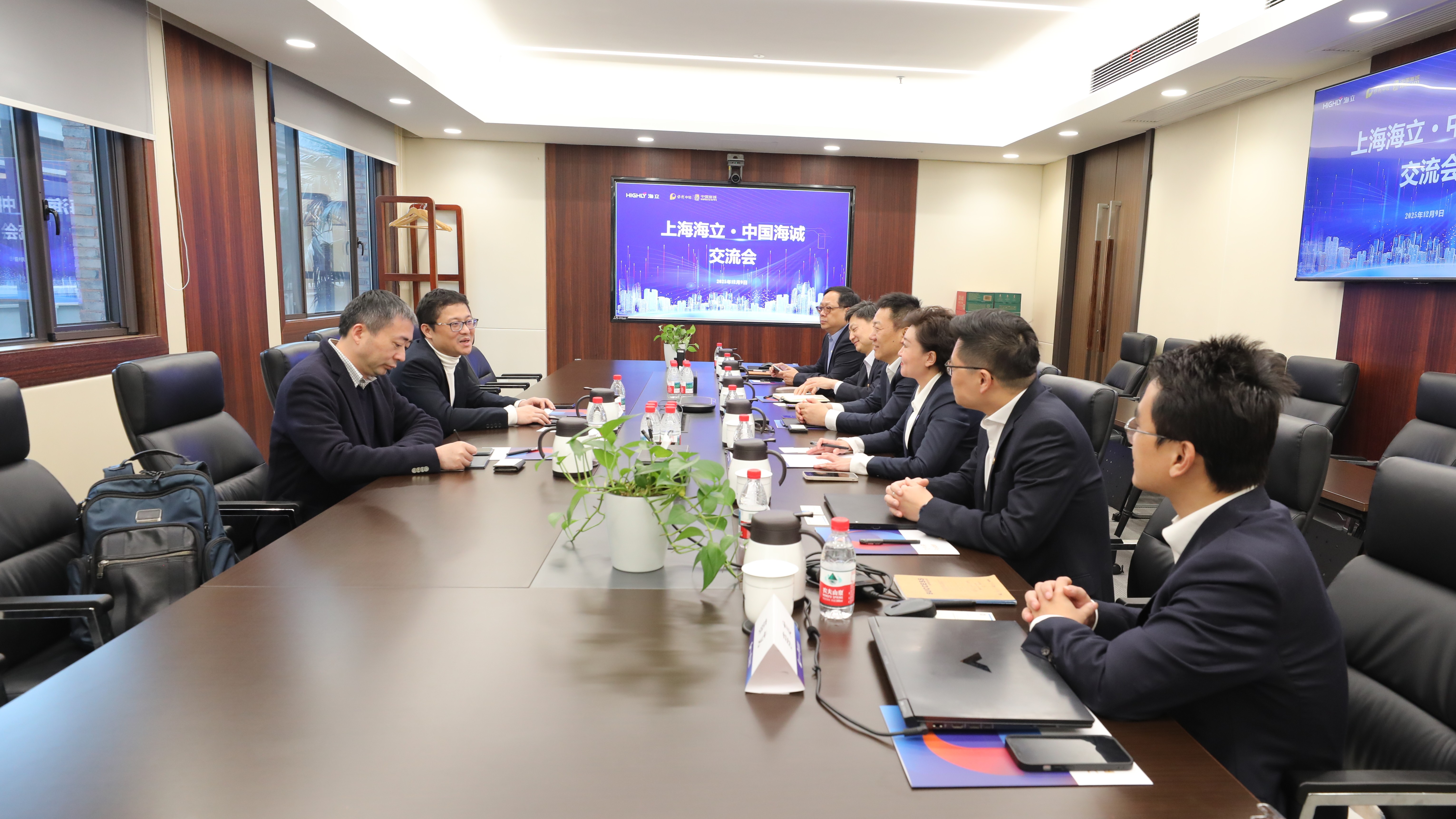 China Haisum Conducts Work Exchanges with Highly Group